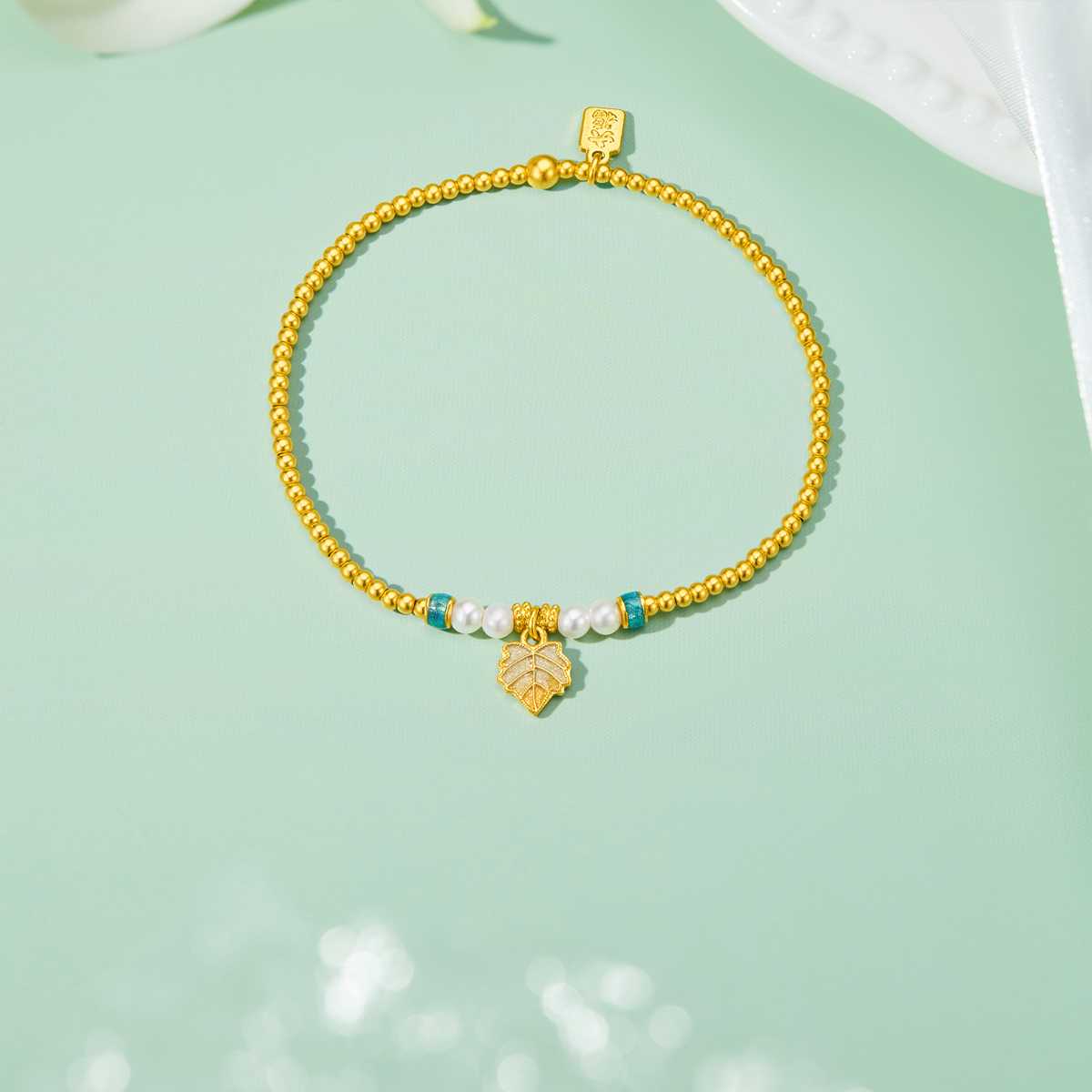 六福珠宝金叶子黄金手链珍珠女款鎏彩工艺金珠手串计价F48G0031DS